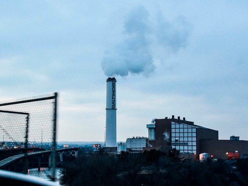 The smokestack of the Wheelabrator Incinerator is seen in Baltimore. Environmental justice is at a turning point.
