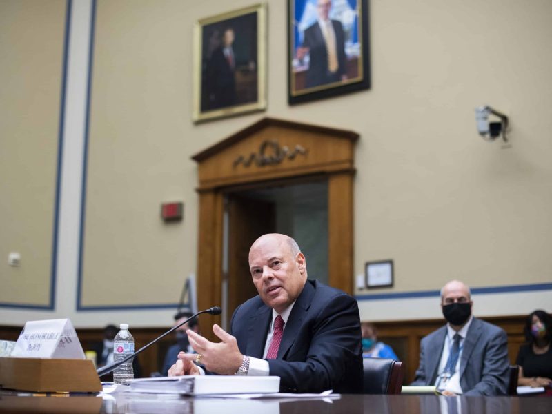 Louis DeJoy testifies during a hearing before a House committee.