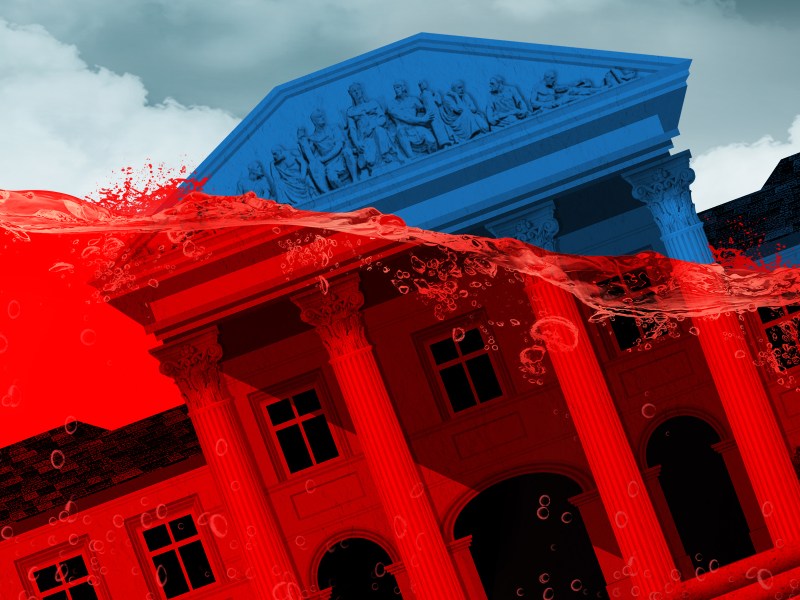 A state supreme court building is sinking as it is being washed under a sea of red.