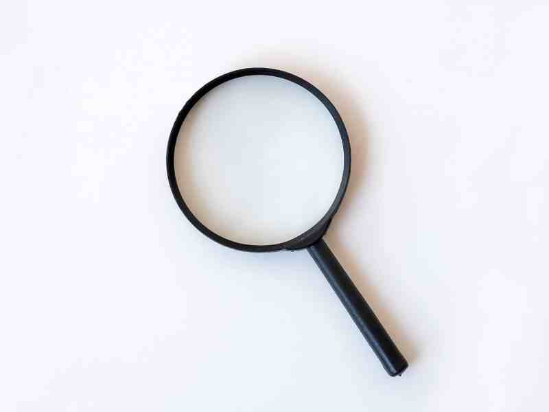 A magnifying glass on a white background.